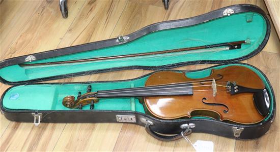 A cased two-piece back violin